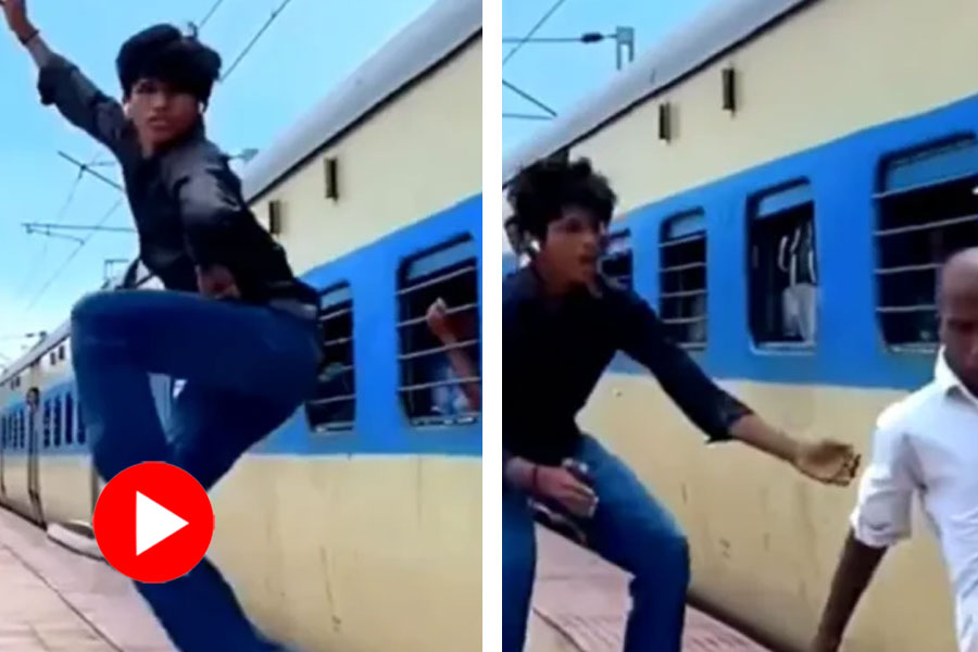 Boy making reel on railway platform saves an elderly person from an accident