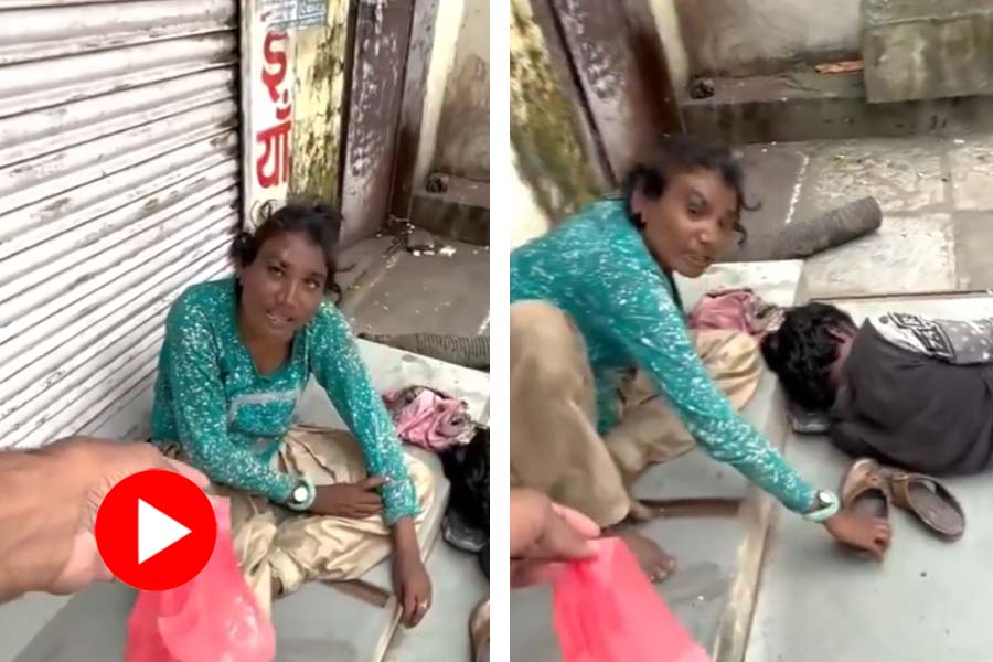 Video of man offering food to homeless woman and getting rejected