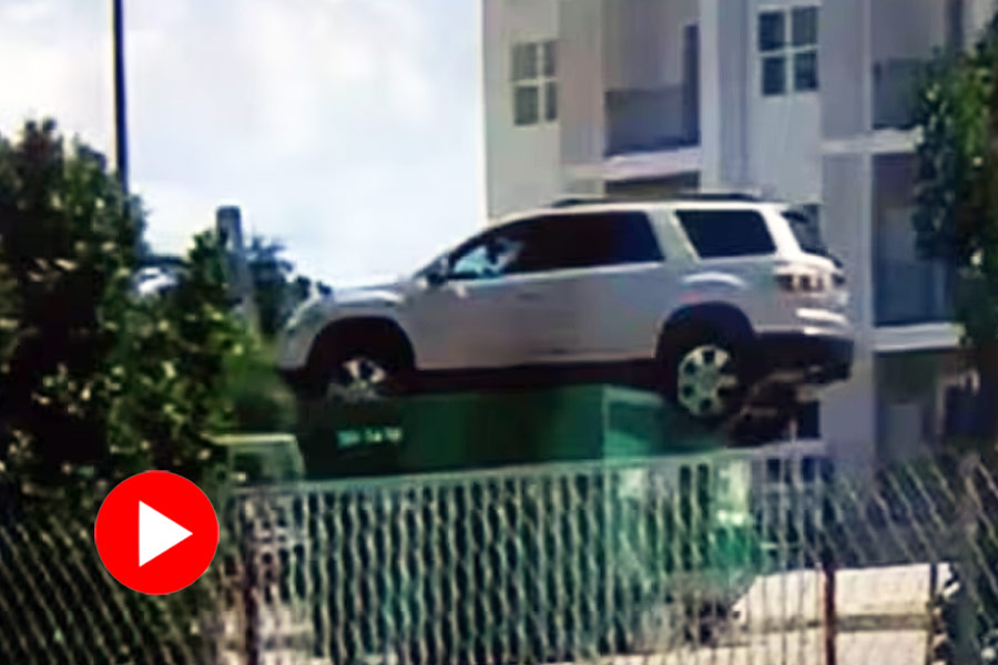 Viral video of SUV on top of a dumpster in Florida USA