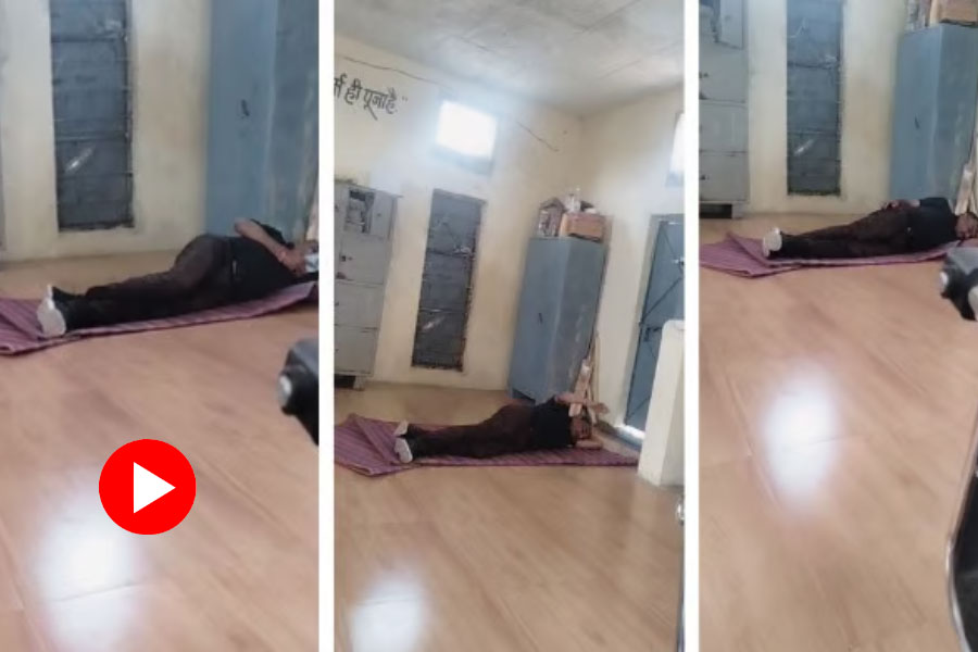 Video of teacher sleeping on class floor in intoxicated state