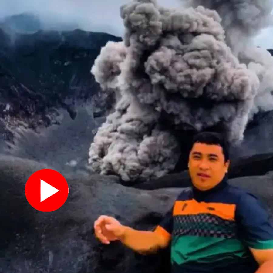 Man lies near volcano to see eruption, Video goes viral