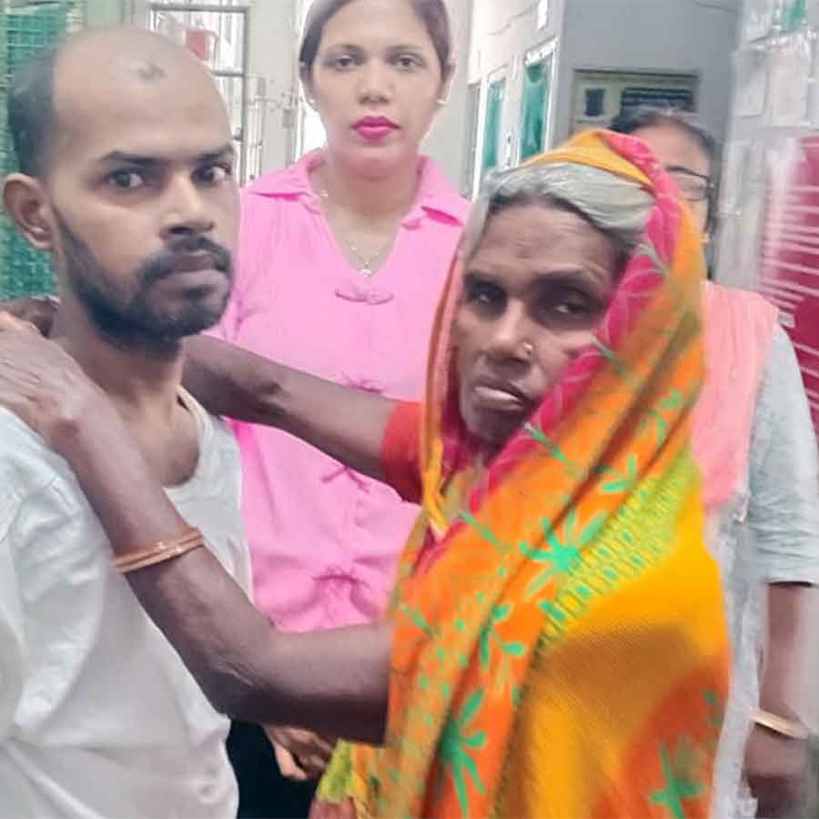 An aged woman got back his son who went missing decade ago