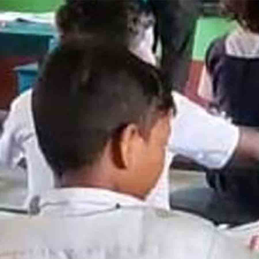 School Secretary and BEd students taking classes in schools at Goghat