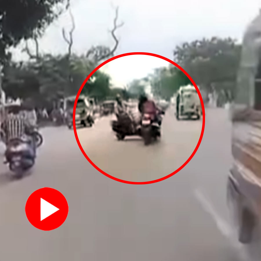 Video of young man riding bike and fall on road with girlfriend