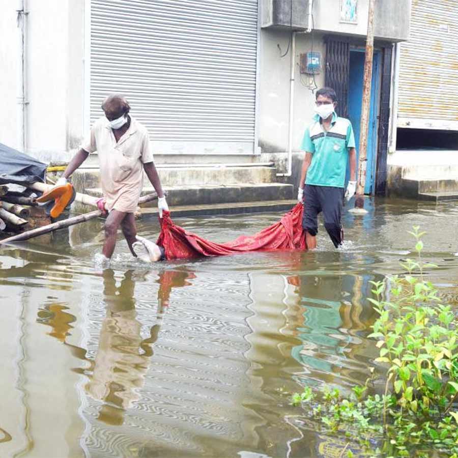 Controversy over the incident of a body being carried away in a sheet in a flooded area of Barasat