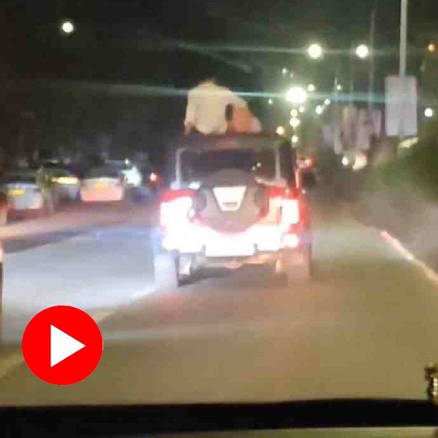 couple engaging in romantic poses in speeding car