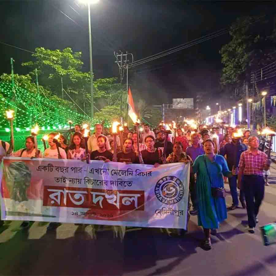 রাজপথে মশাল হাতে মিছিল। 