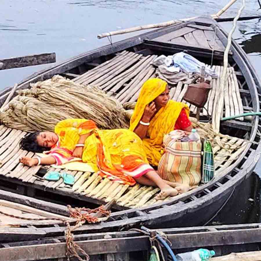 A woman Suffering from labour pain was rushed to hospital in a boat as areas of Bhutni are submerged in water