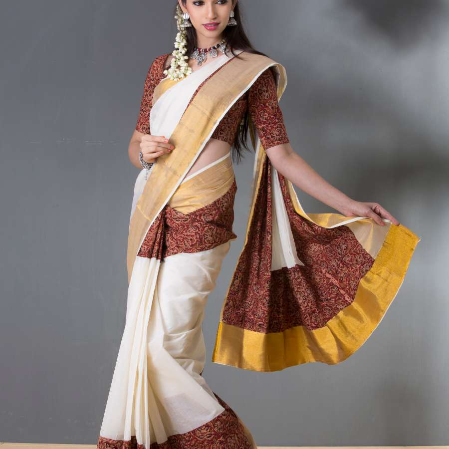  প্রি-ড্রেপড শাড়ি: এ বার পুজোয় আদর্শ সাজের তালিকায় জায়গা পেতেই পারে প্রি-ড্রেপড শাড়ি। কারণ, কুঁচি বা আঁচল আগে থেকেই করা থাকে এই শাড়িতে। ফলে পরতে বা সামলাতে কোনও ঝক্কি নেই। শাড়ি পরতে অনভ্যস্তরা বিকল্প হিসাবে তার এই আধুনিক সংস্করণে কাজ চালাতেই পারেন। 