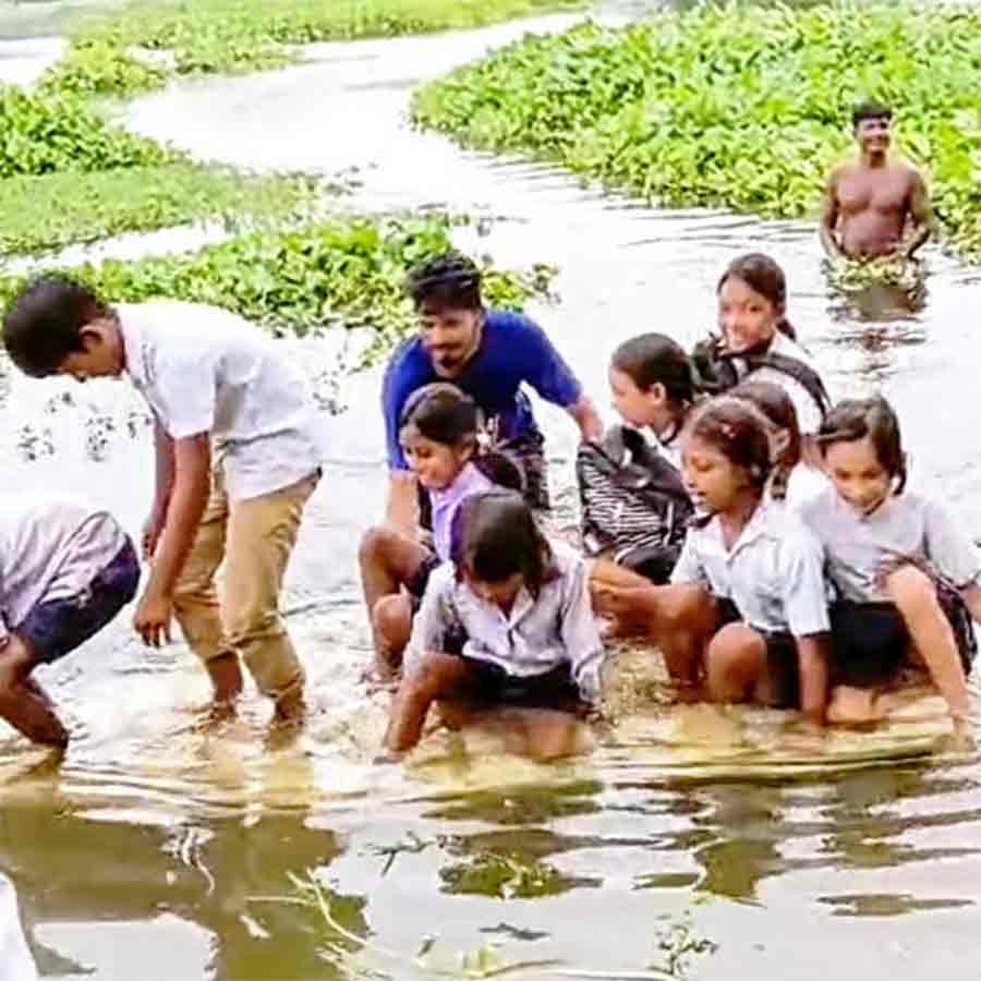 local residents and school student relying on weak Polystyrene boats to cross river at Mathabhanga