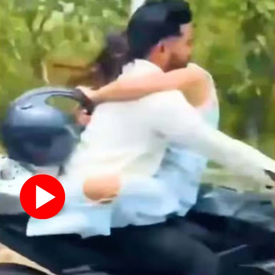 Uttar Pradesh police issued challan as Video shows couple romancing on bike