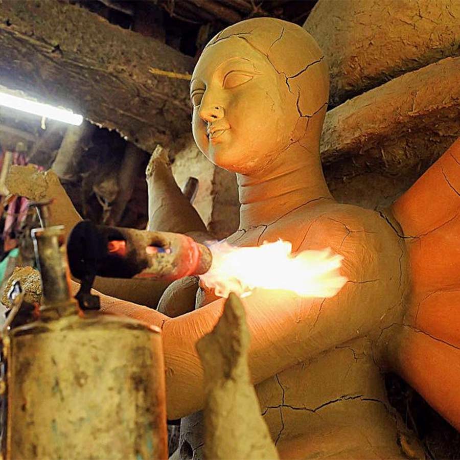 Clay artisans of Kumortuli hopes rain may stop and sunny day arrives