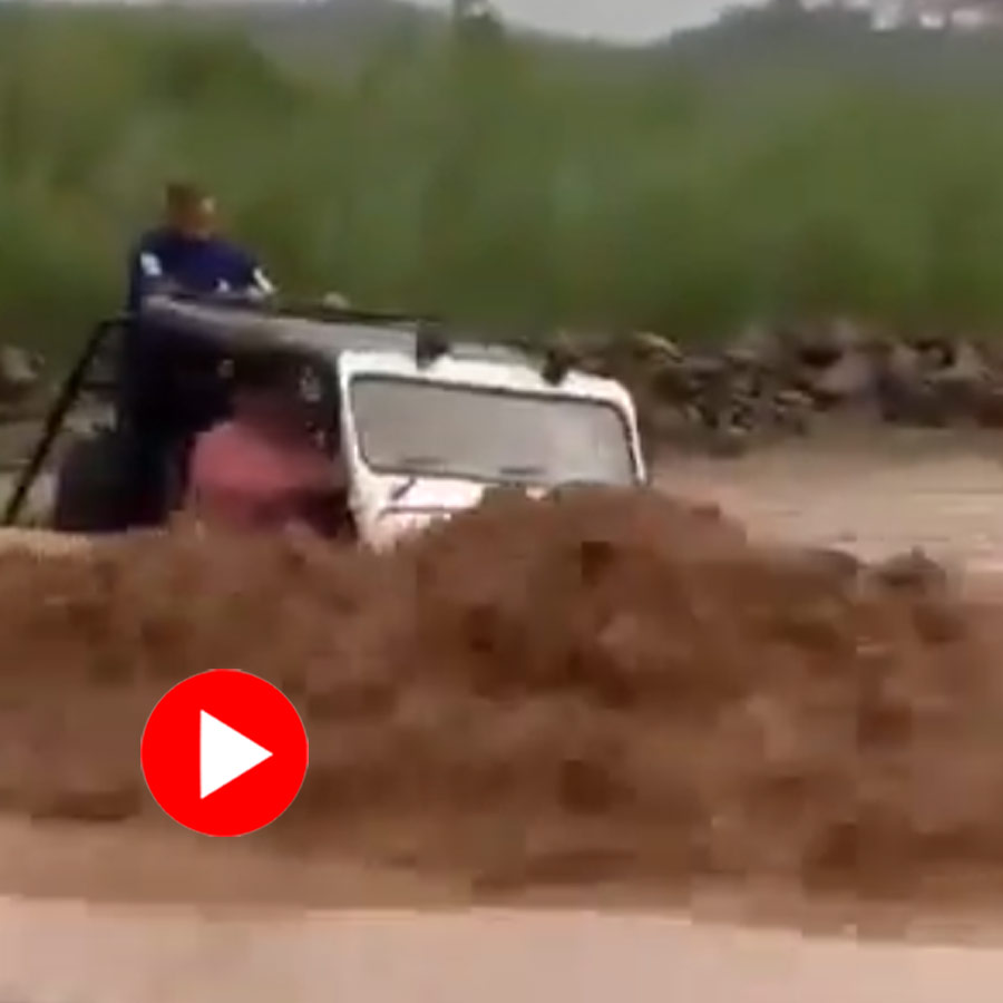 Video shows car carrying two man swept away in river