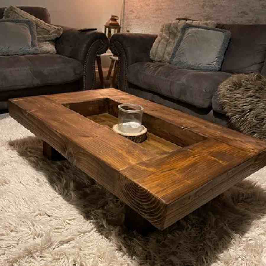 কাঠের কফি টেবিলও কিন্তু  হতে পারে মানানসই।