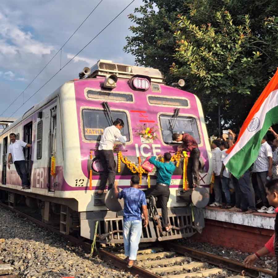 hawkers and other daily passengers happy after getting a new emu evening train at kirnahar station