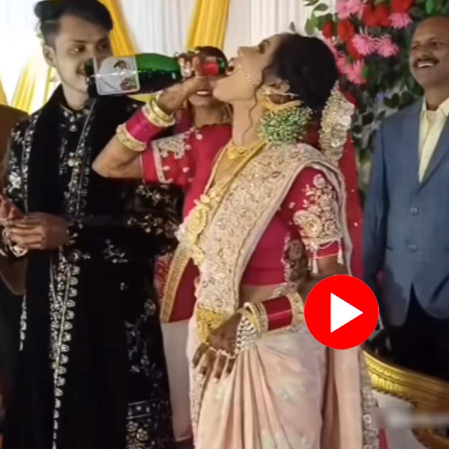 Video shows bride and groom drinking champagne in wedding