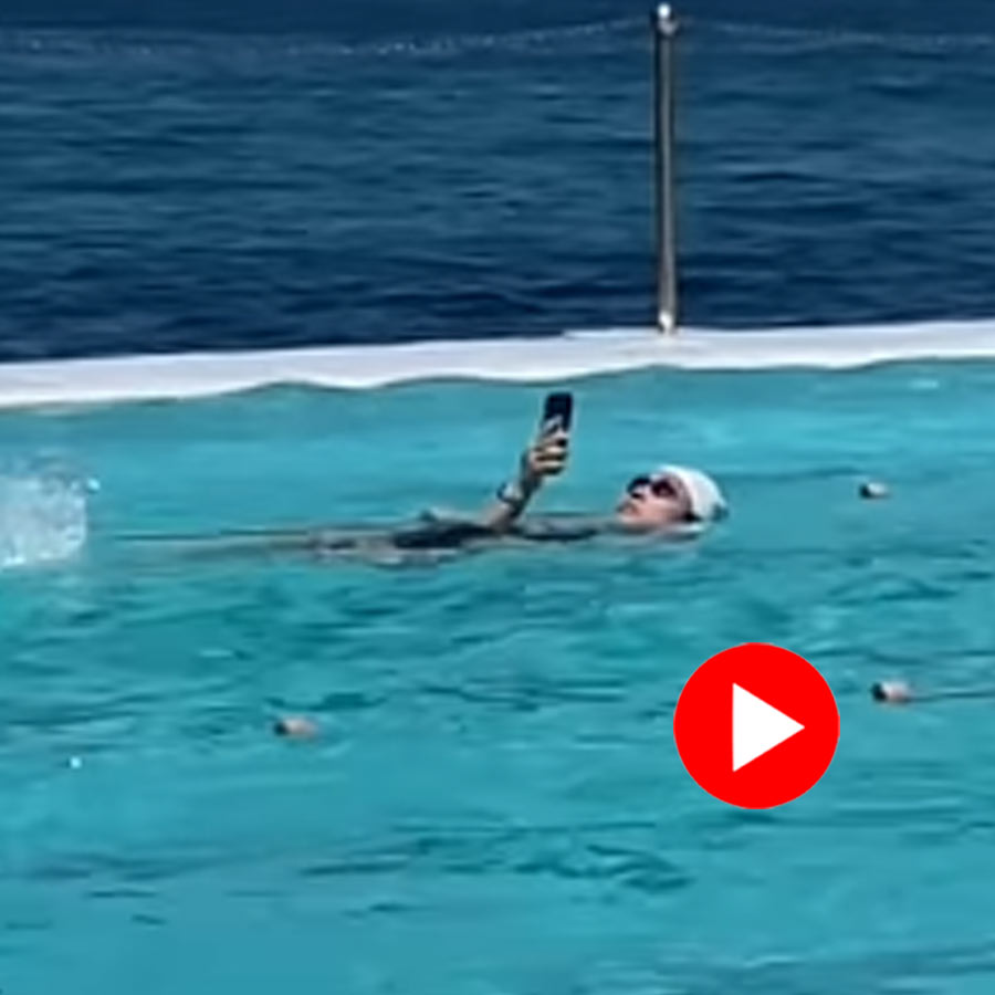 Video of woman swimming with phone in Australia goes viral dgtl