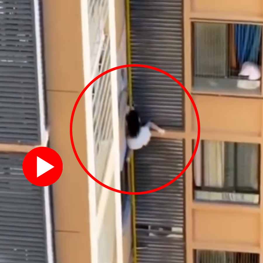 Video of woman dangling from a 10th-floor balcony to escape lover’s wife in China goes viral dgtl