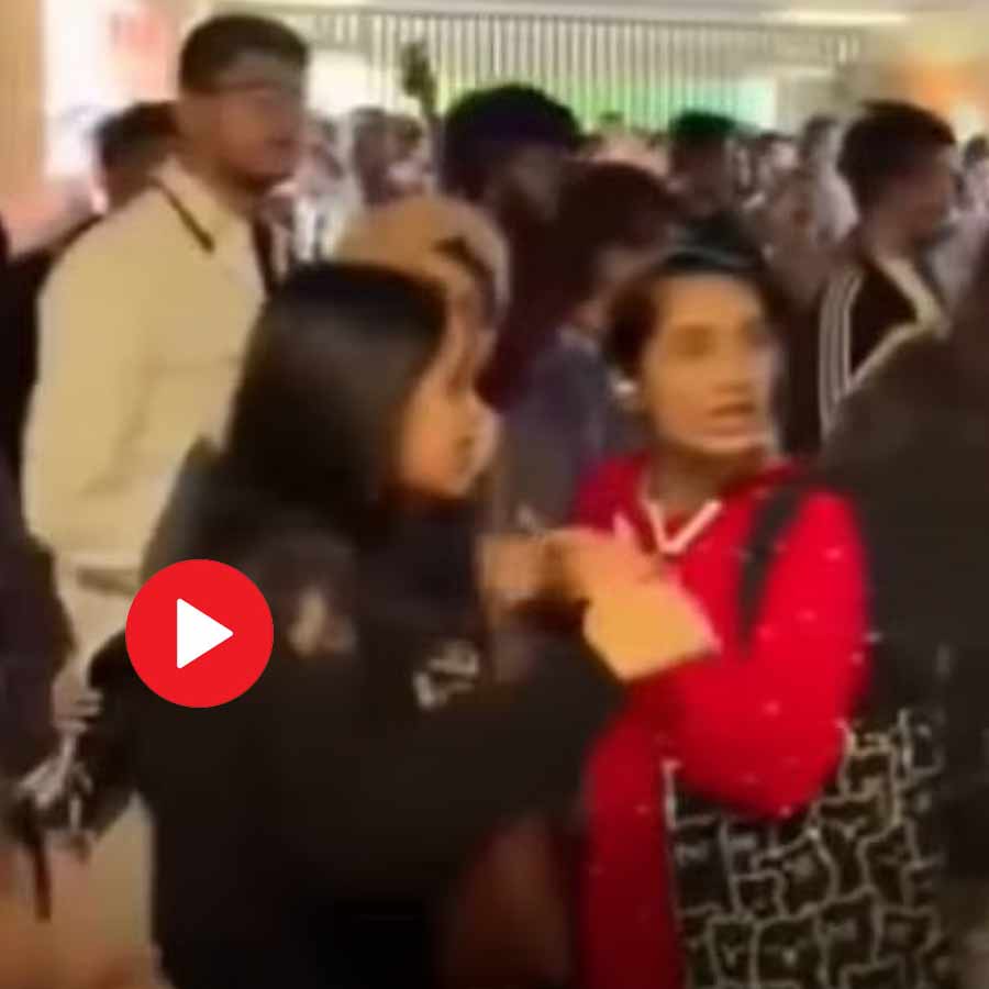 University in Dhaka shows students panicking after an escalator suddenly malfunctioned