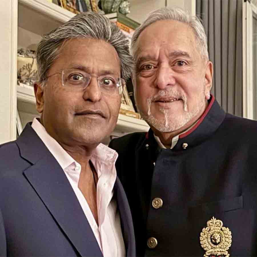 (বাঁ দিকে) ললিত মোদী এবং বিজয় মাল্য (ডান দিকে)।