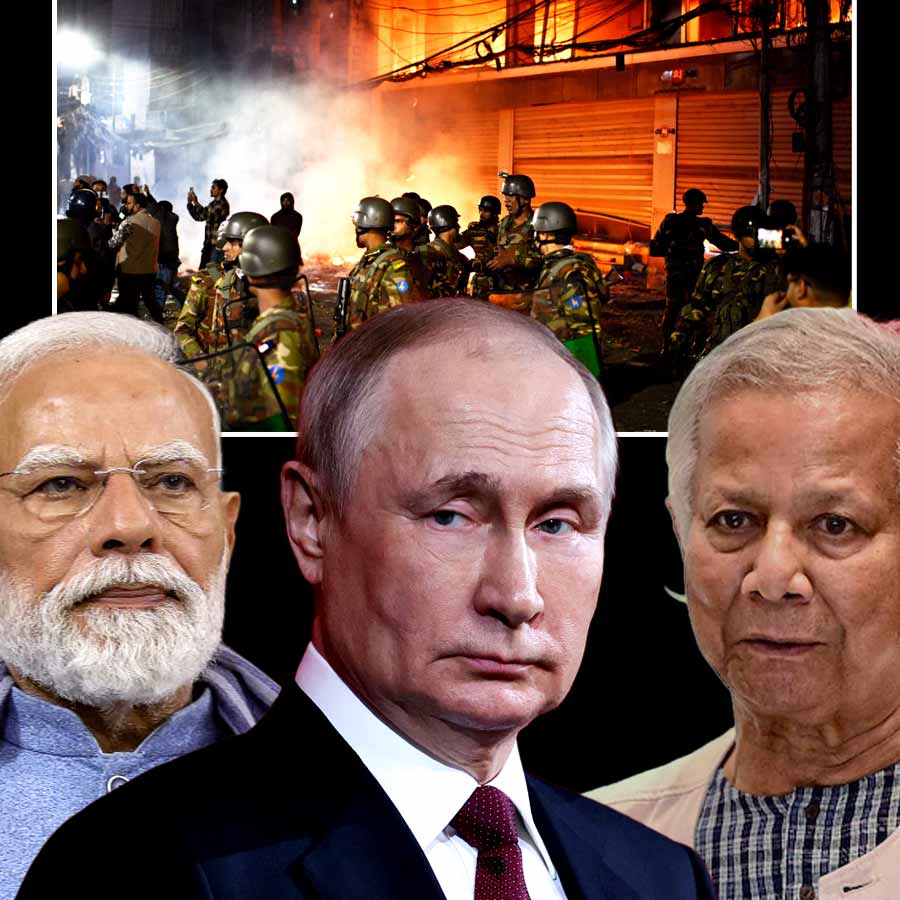 (বাঁ দিক থেকে) নরেন্দ্র মোদী, ভ্লাদিমির পুতিন এবং মুহাম্মদ ইউনূস।