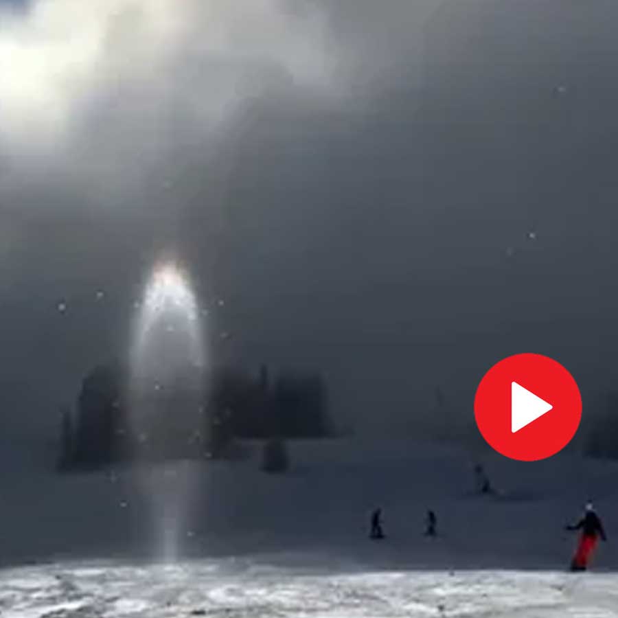 rare vertical light pillar seen below the Sun