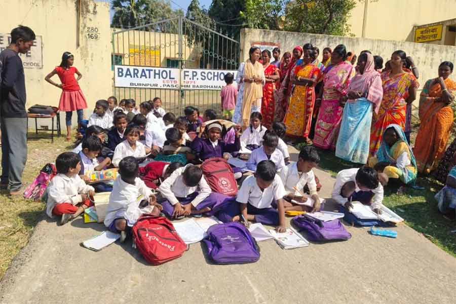 Local residents of Burnpur closed the gate of a dilapidated school building in demand of renovation