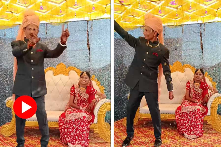 Groom ends up resting on bride’s lap while dancing on his wedding dgtl