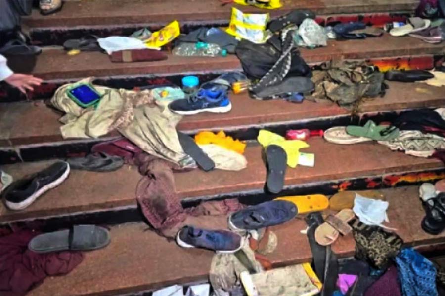 Shoes, spectacles, bags seen scattered all over the staircase of overbridge at New Delhi Railway station dgtl