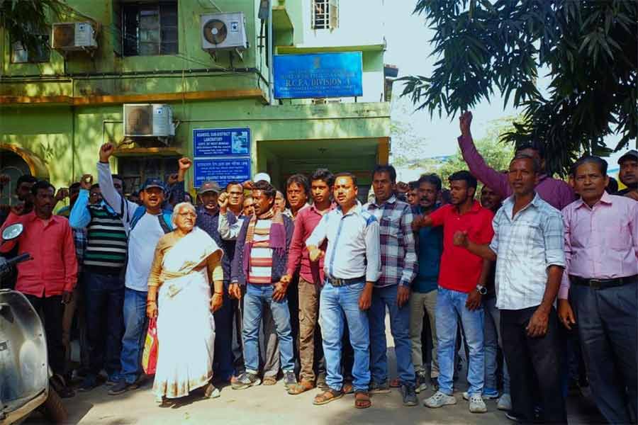 Contractual workers of Water Project on protest near Public Health Engineering Department of Asansol demand clearance of their arrears