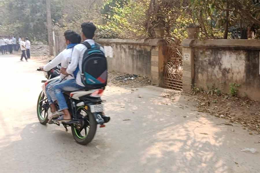 Madhyamik Examination 2025 candidates sighted in motorbikes without helmet at Guskara