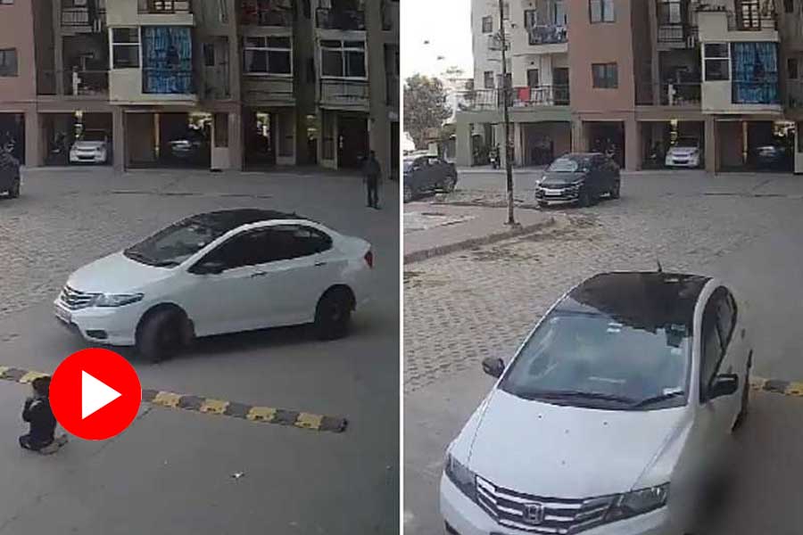 Video of Woman runs car over child playing outside society of Ghaziabad