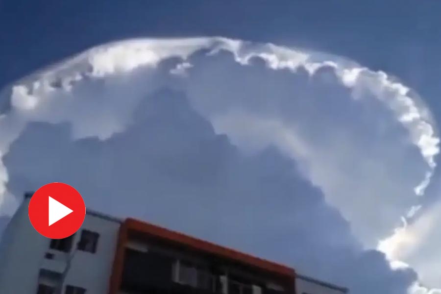 Viral video of huge cloud formation that looked like UFO above a building