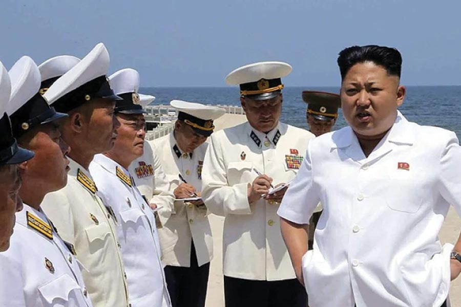 Kim Jong un North Korean Supreme Leader reveals largest ever warship armed with vertical launch nuclear missile system 