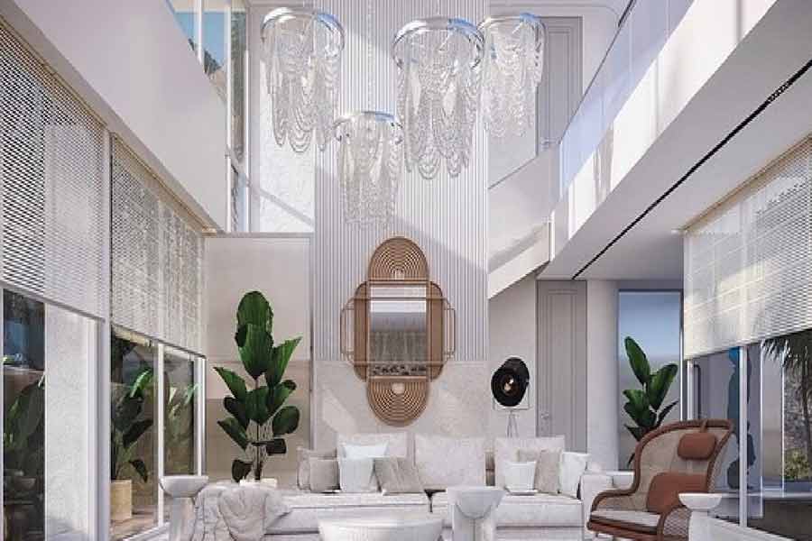 বিনোদনের জন্য বসবার ঘরে কোনও টেলিভিশন স্ক্রিন অথবা মিউজ়িক সিস্টেম নেই। উঁচু সিলিঙের লিভিং রুমে আলো যাতায়াতের পরিমাণও যথেষ্ট।