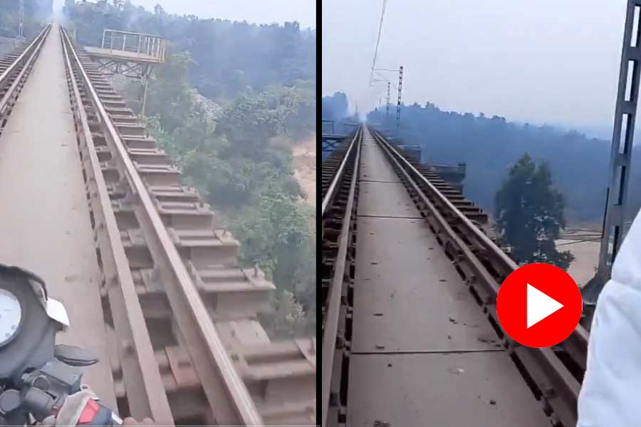 Man rides bike on railway bridge in Jharkhand, video goes viral