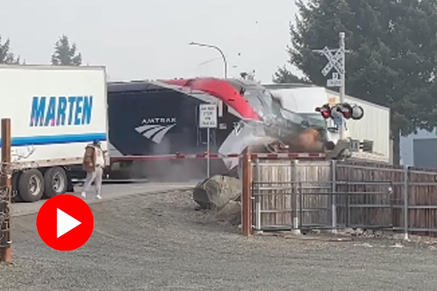 Amtrak train bushes into a semitruck stuck on line in Washington, video goes viral