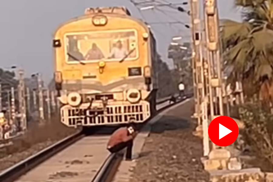 Viral video of a man sitting on the track despite an approaching train in UP