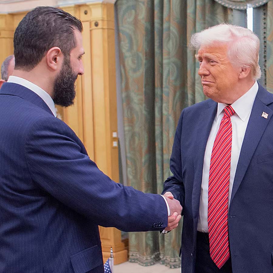 US President Donald Trump signs executive order lifting US sanctions on Syria dgtl