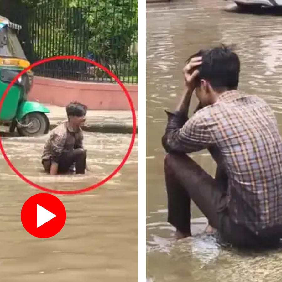 man who lost his phone into open drainage