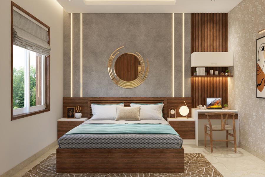 খাটের পিছনের দেওয়ালে চওড়া বা সুদৃশ্য ফ্রেমের একটু বড় আয়না লাগাতে পারেন।