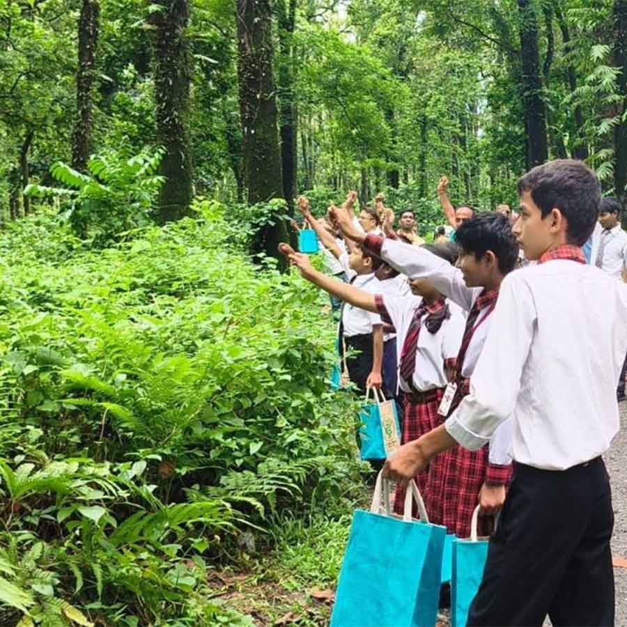 Students of Mal Adarsh Vidhya Bhawan of Malbazar spread seeds of trees dreaming of a greener world in future