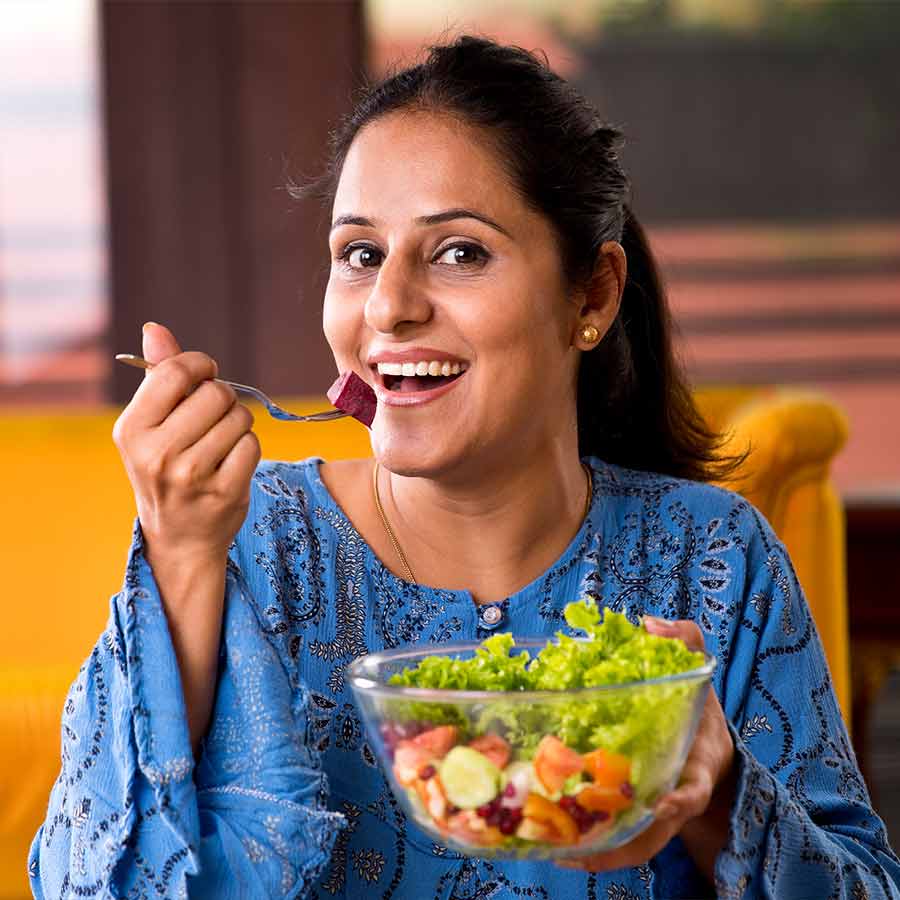 How much vegetable should an adult eat per day