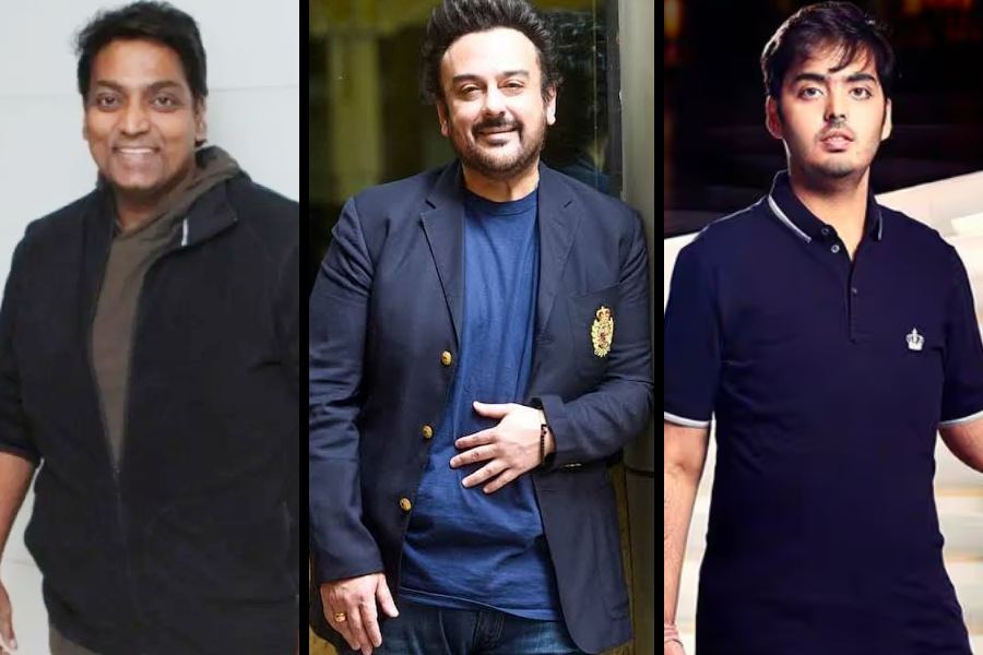 (বাঁ দিক থেকে) গণেশ আচার্য, আদনান সামি এবং অনন্ত অম্বানী। 