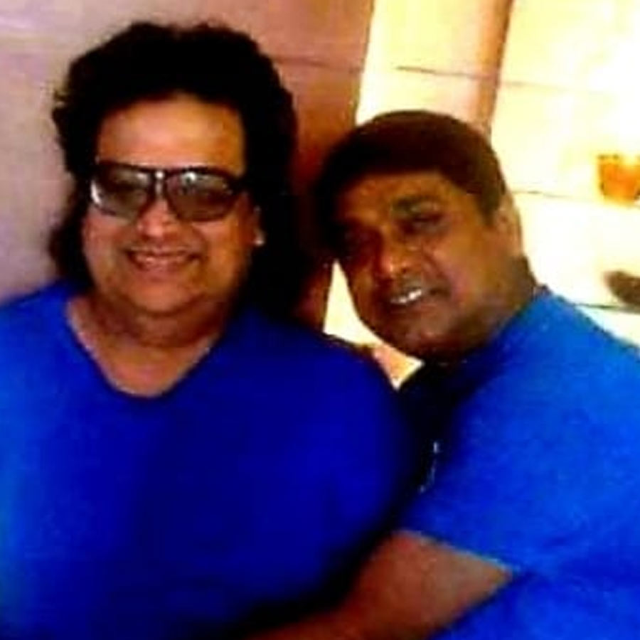 বাপ্পি লাহিড়ীর সঙ্গে পার্থ চক্রবর্তী।