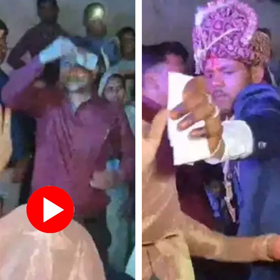 Video shows relative done bizarre act with money in wedding ceremony