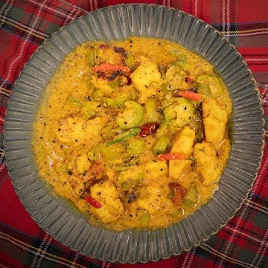A Traditional Bengali summer Recipe of ridge gourd or Jhinge with yellow split peas dgtl