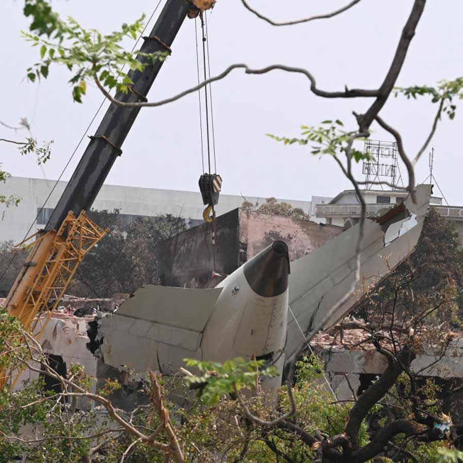 Burned head recovered while trying to remove the wings of the crashed plane by pulling them with a crane in Ahmedabad