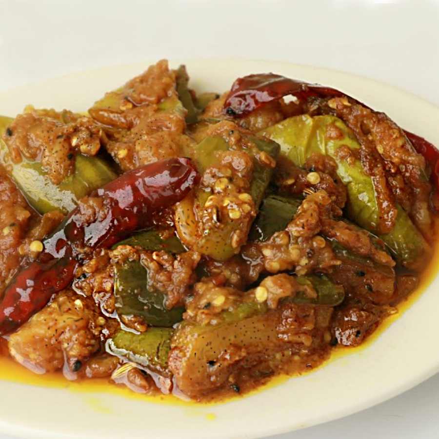 A Recipe of Brinjal with Garlic and mustard paste named Achar Bhorta dgtl