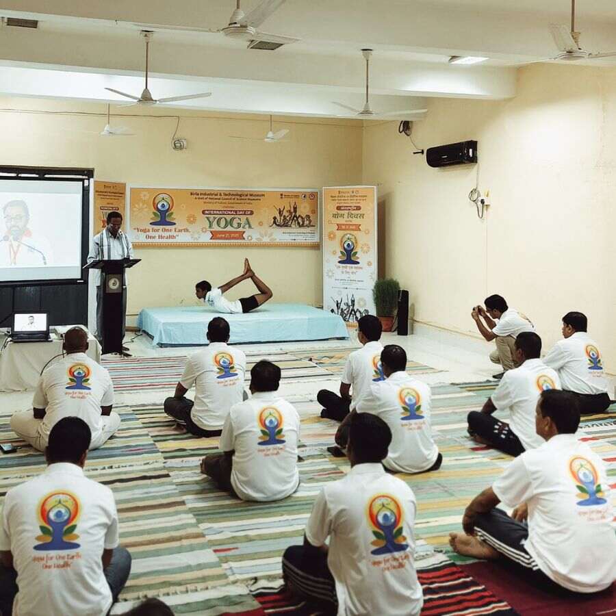 Students participating in a quiz competition organized at BITM's yoga workshop.